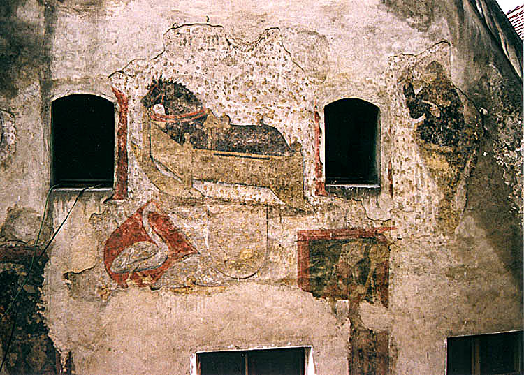 Soukenická no. 35, facade, fragments of frescos from 1470's  - St. Florián, horse in cradle, and masked man