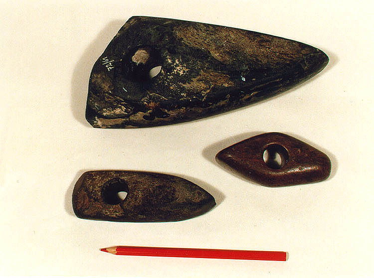 Planished and drilled hammers made of stone discovered in the Český Krumlov region in the early and late Stone Age (approximately 4000 - 2000 BC). The Collection Fund of the Český Krumlov District History and Geography Museum.