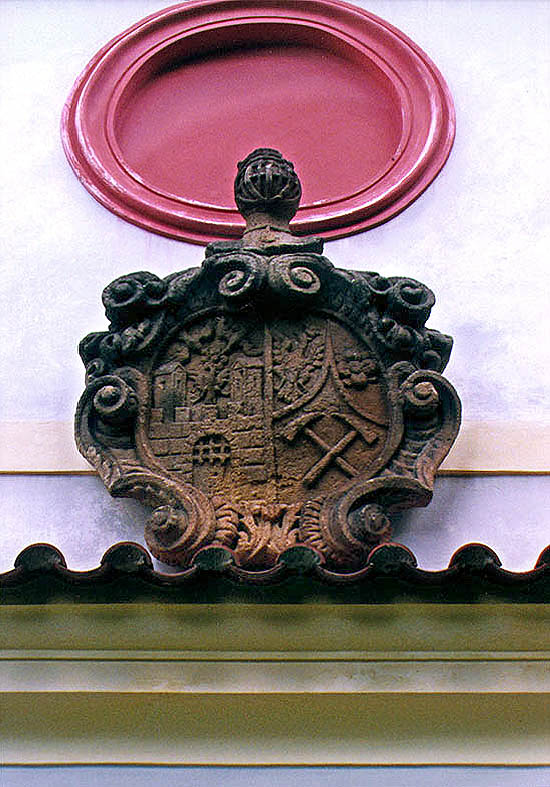 Chapel on Křížová hora (Cross Hill) in Český Krumlov, coat-of-arms of town and miners above the portal