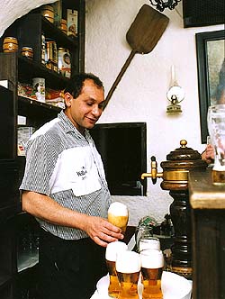 Restaurant Cikánská jizba, bar with owner Milan Kotlár and Krumlov beer 