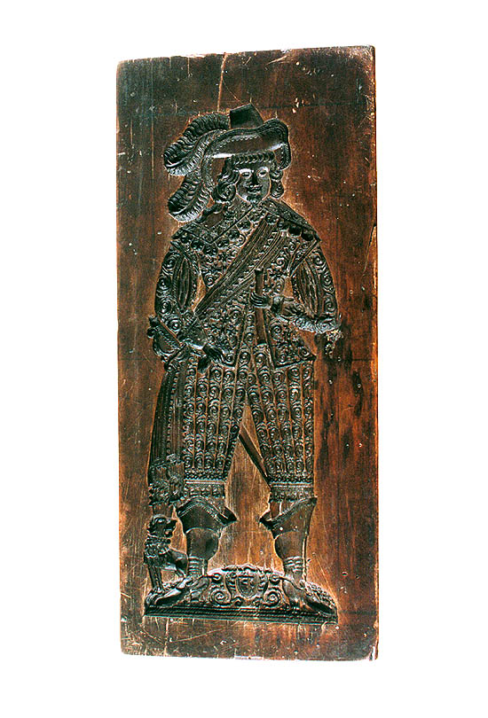 Die älteste erhaltene Lebkuchenform (beiderseitig) aus dem Jahre 1645, auf der Oberseite die Gestalt eines Kavaliers, Sammlungsfonds des Bezirksheimatmuseums Český Krumlov
