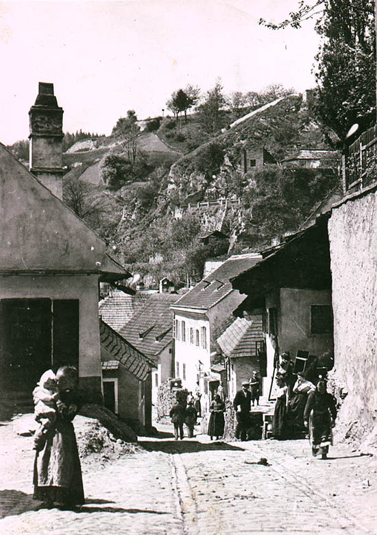 Street in Plešivec area in Český Krumlov, town inhabitants, historical photo