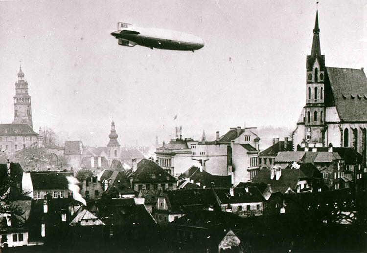 Zeppelin flying above Český Krumlov, historical photo